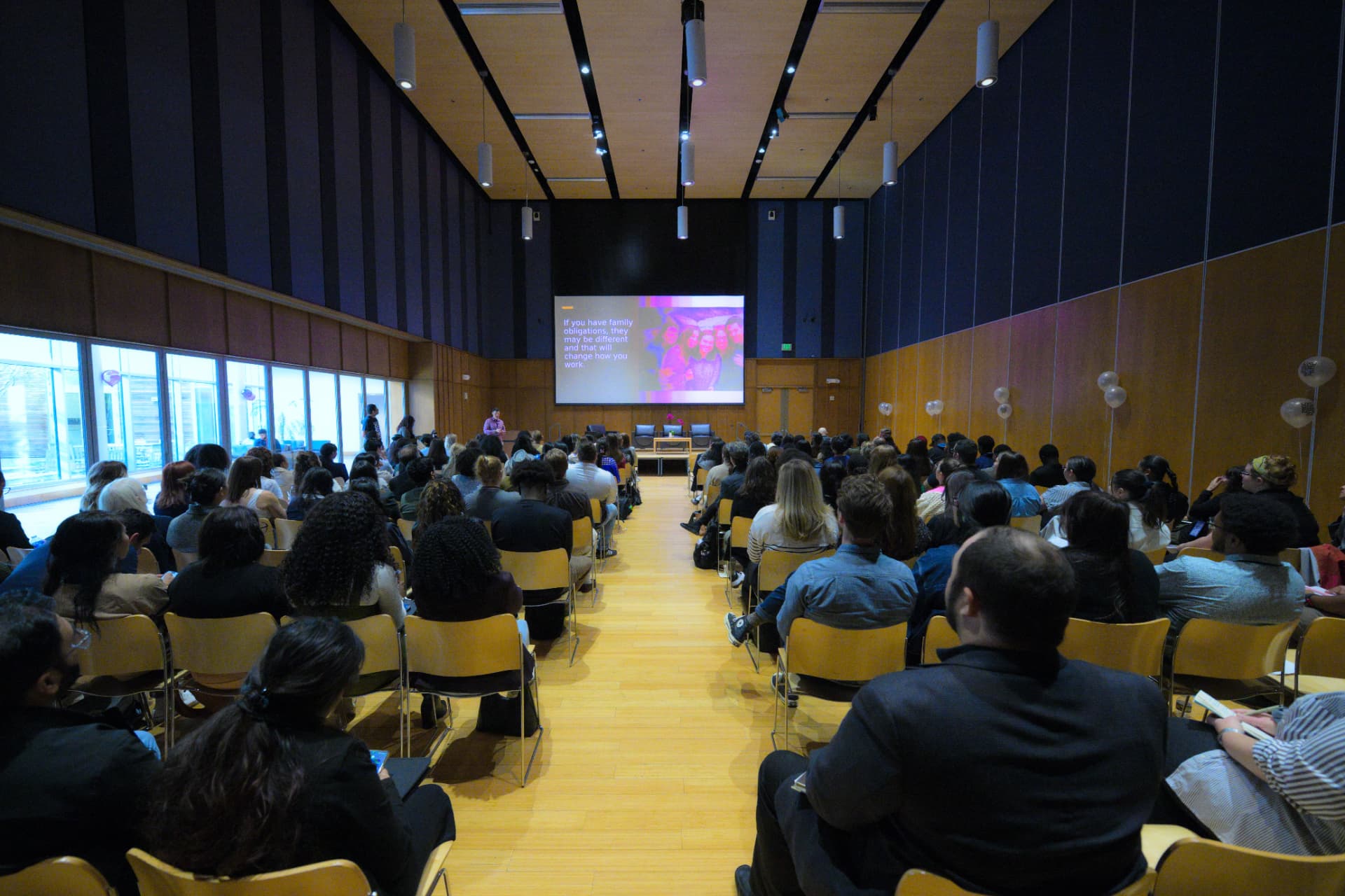 A full audience gathered for a UXU conference presentation